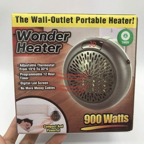 Портативний тепловентилятор мініобігрівач у розетку Wonder Heater 900W 851 фото