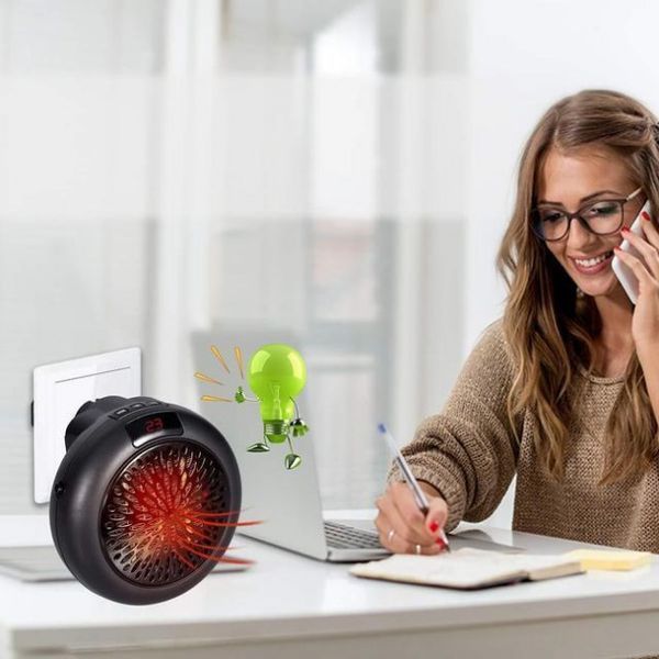 Портативний тепловентилятор мініобігрівач у розетку Wonder Heater 900W 851 фото