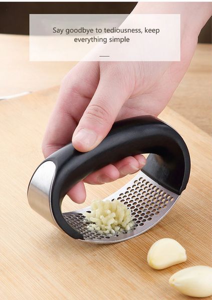 Прес для часнику Garlic press 10.7х5.1х6.9 см із неіржавкої сталі з пластиковою ручкою TV801 фото