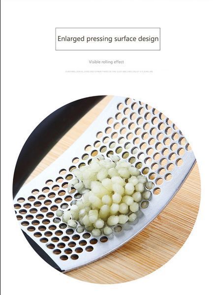 Прес для часнику Garlic press 10.7х5.1х6.9 см із неіржавкої сталі з пластиковою ручкою TV801 фото