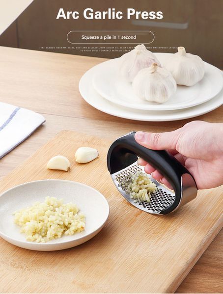 Прес для часнику Garlic press 10.7х5.1х6.9 см із неіржавкої сталі з пластиковою ручкою TV801 фото