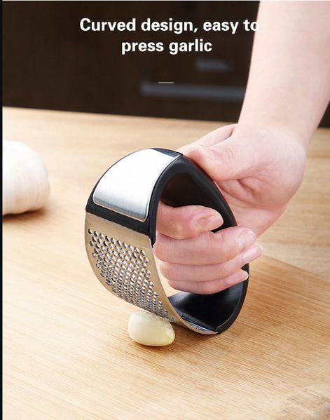 Прес для часнику Garlic press 10.7х5.1х6.9 см із неіржавкої сталі з пластиковою ручкою TV801 фото
