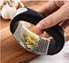 Прес для часнику Garlic press 10.7х5.1х6.9 см із неіржавкої сталі з пластиковою ручкою TV801 фото 1